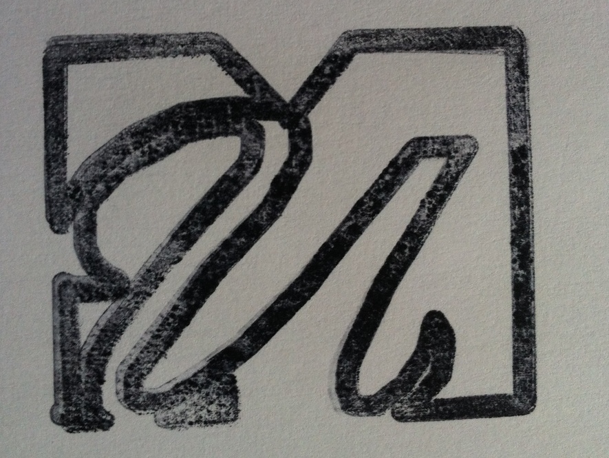 The resulting ink stamp from the UML Logo