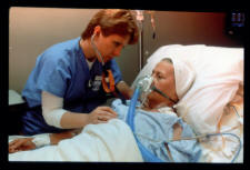 Nurse with patient.  Photo courtesy of National Institutes of Health