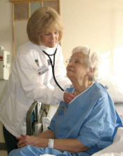 Nurse with patient.  Photo courtesy of the National Institute of Standards and Technology